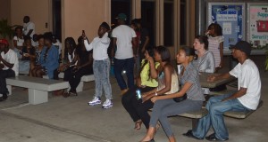 Students and visitors looks on at performances during UVI Mix event